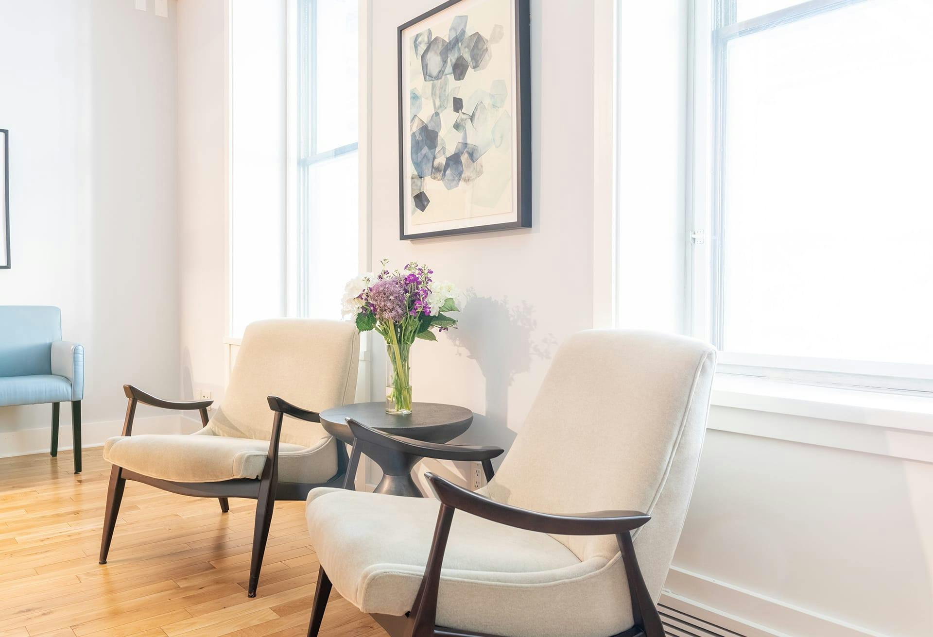 Waiting Room with Two White Chairs