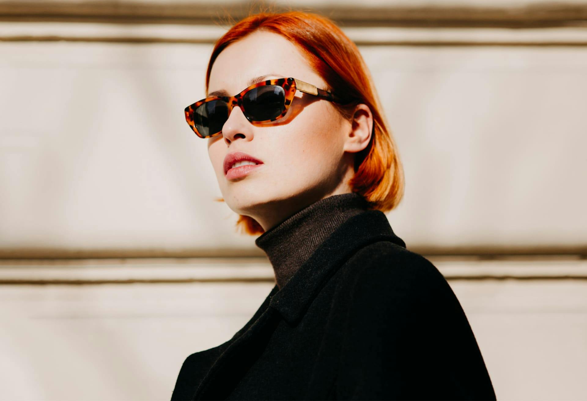 Woman with Red Hair, Sunglasses and Turtleneck