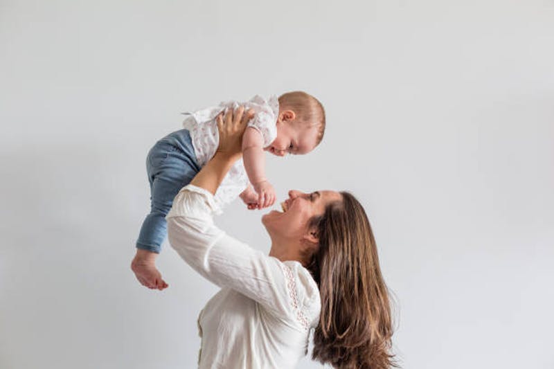 Woman with Her Baby