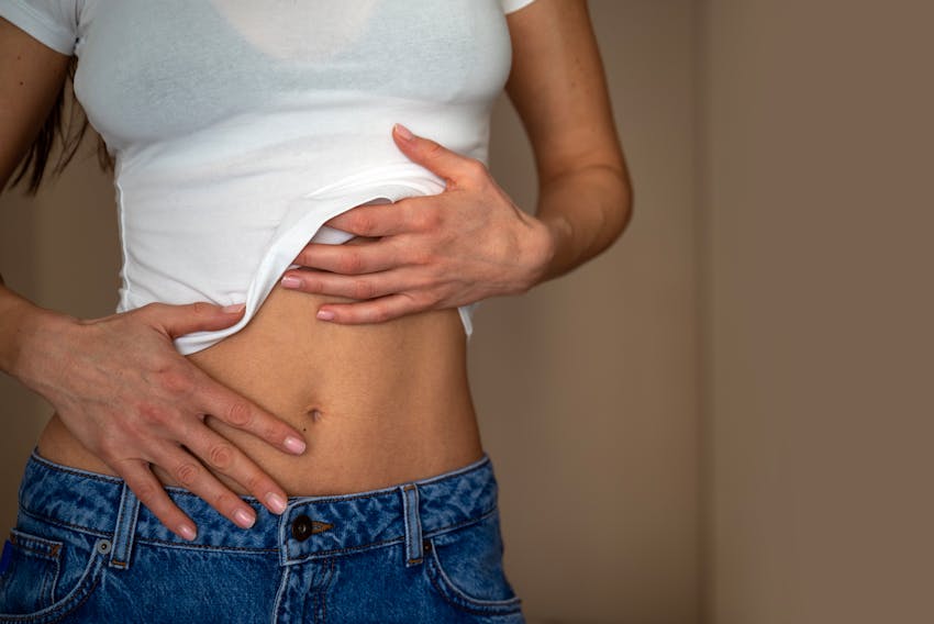 woman in jeans and white tshirt