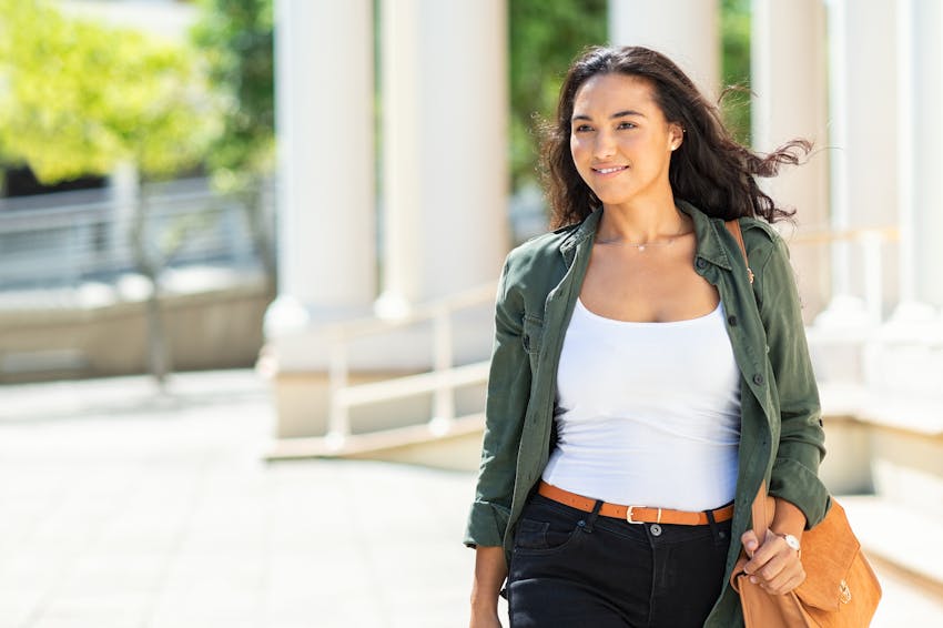 woman in green overshirt