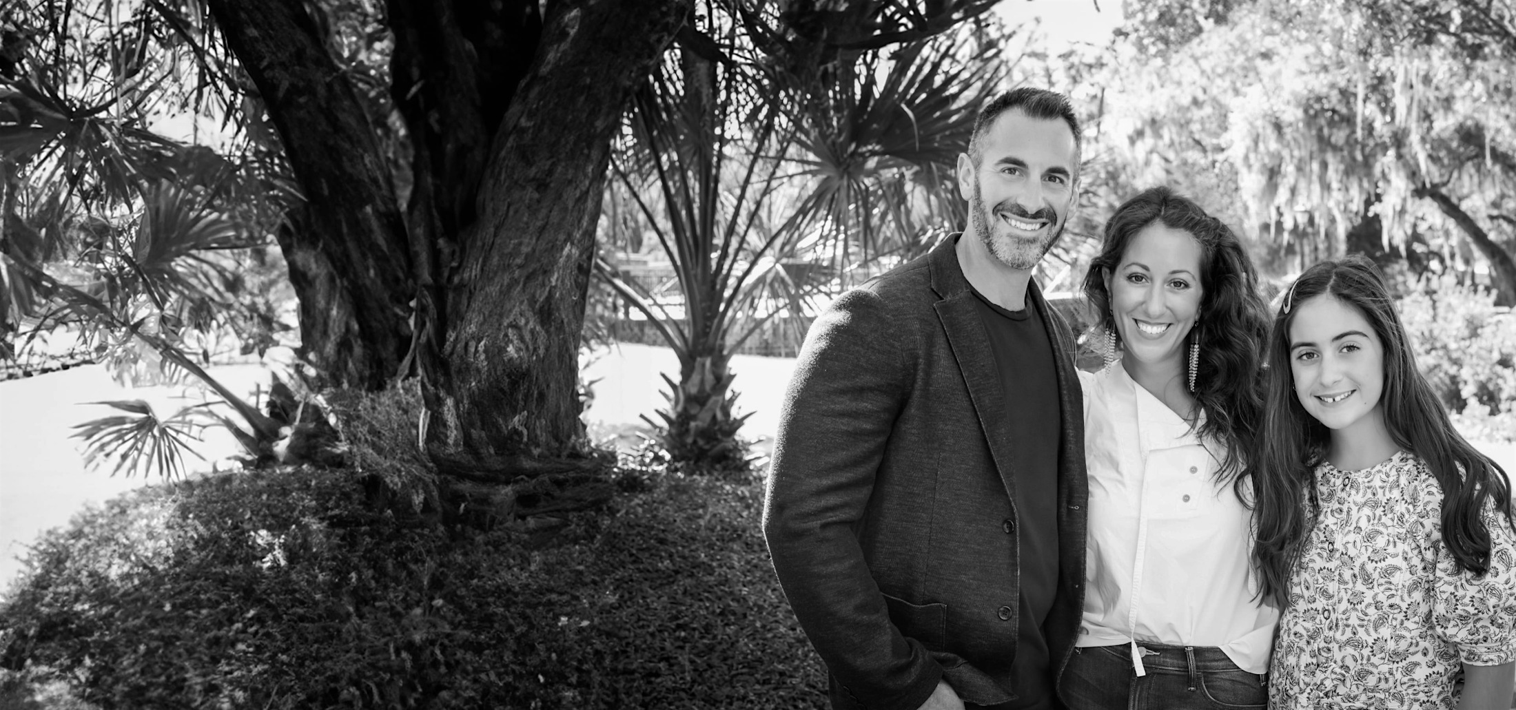 Dr. Solomon and his family, outside