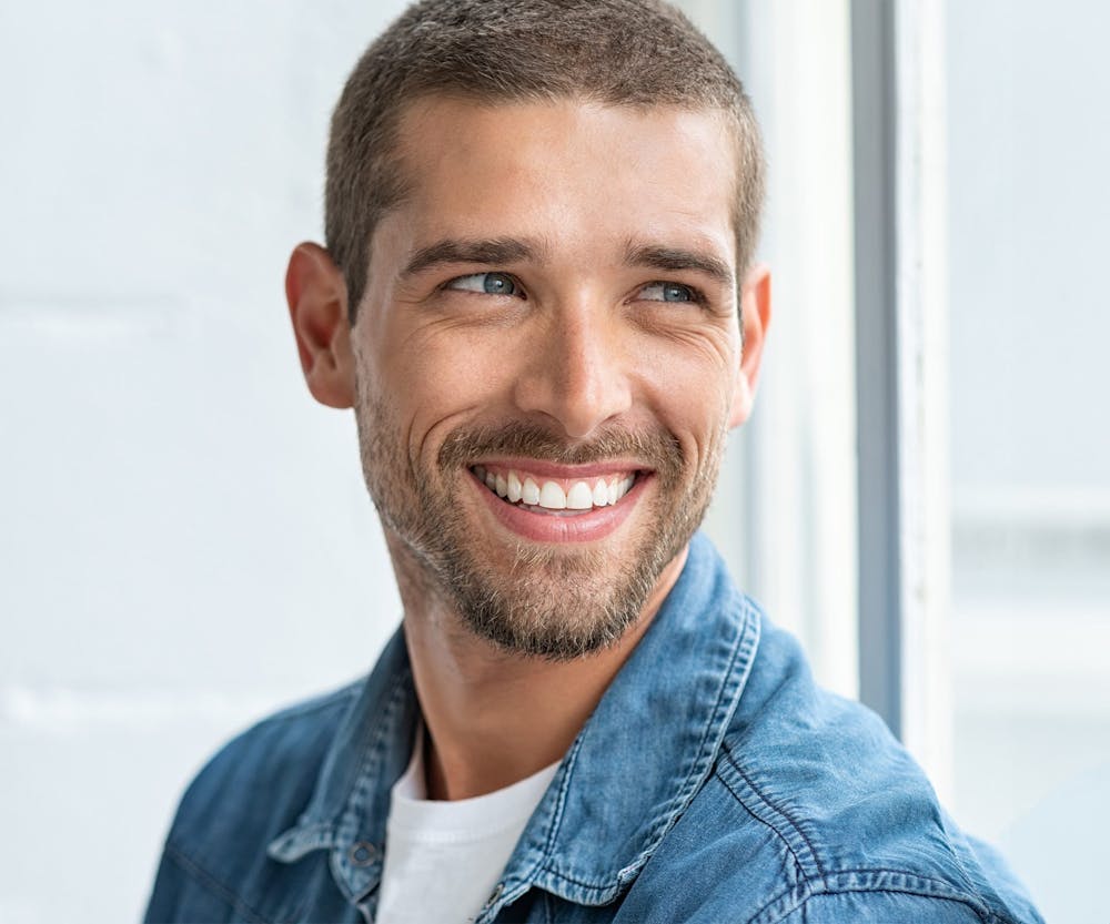 man looking out the window to the right