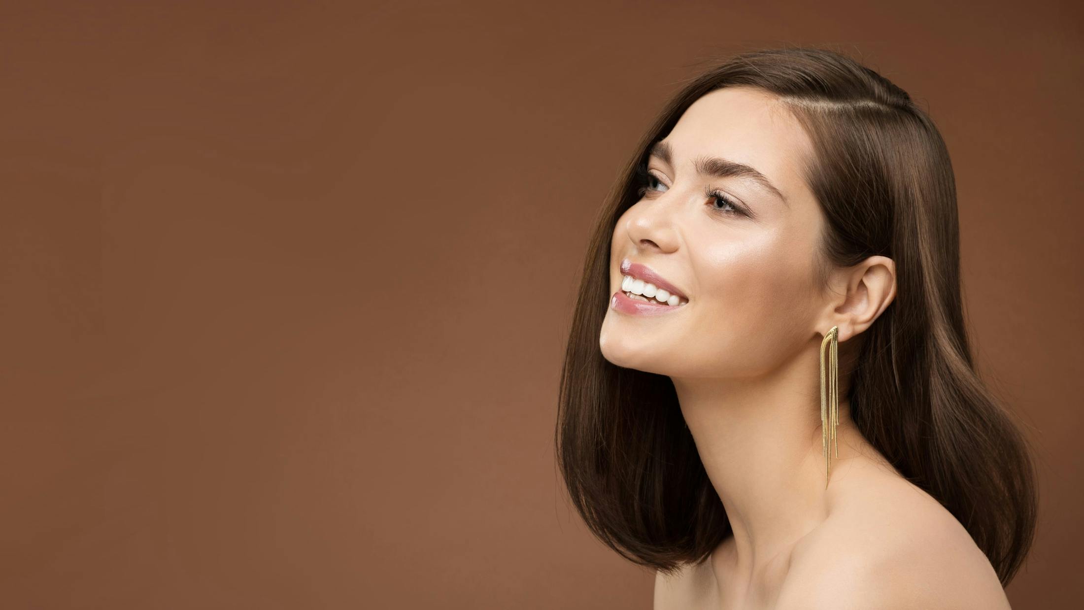 Woman looking to the side and smiling