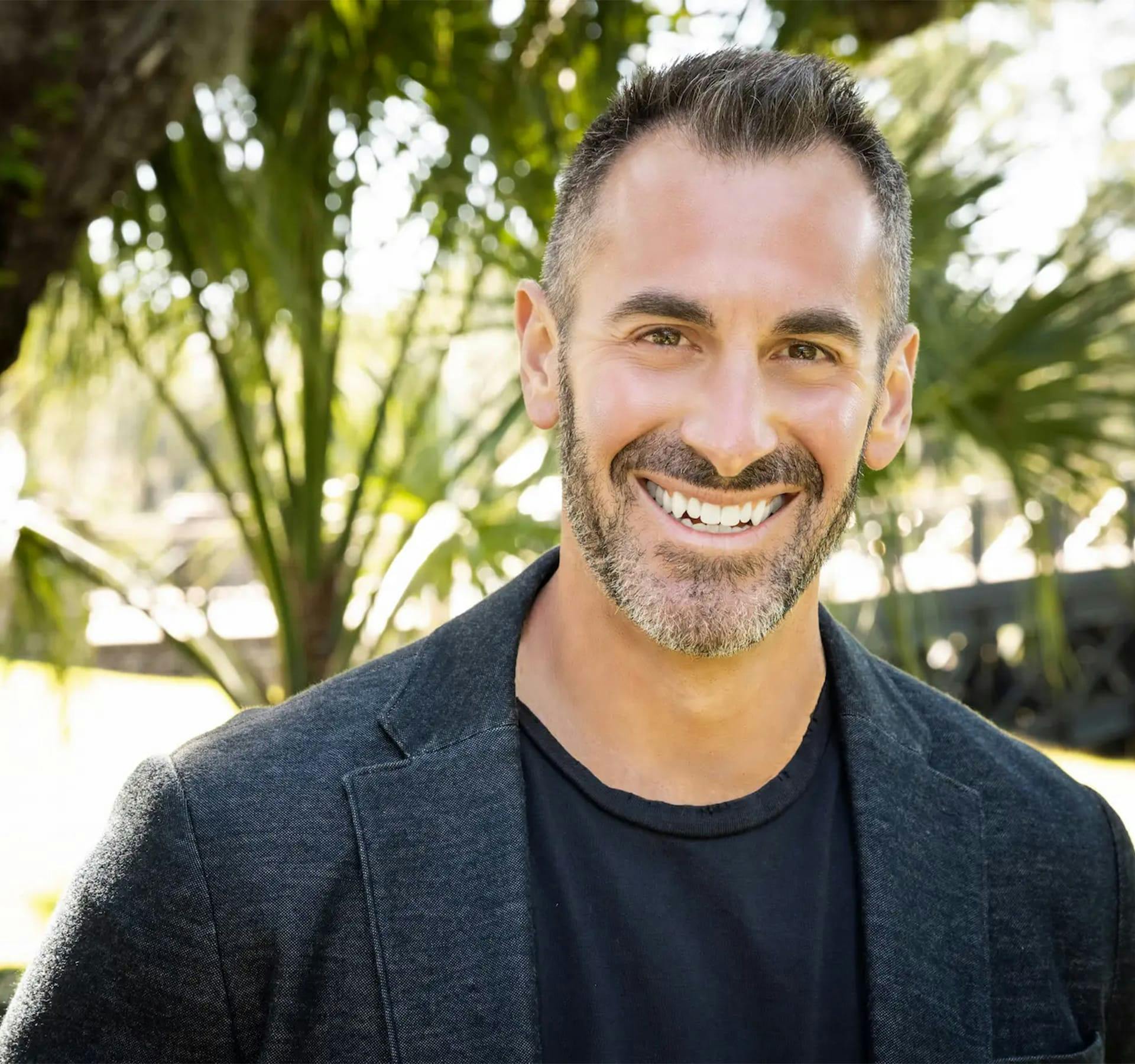 Dr. Jeff Solomon with arms crossed
