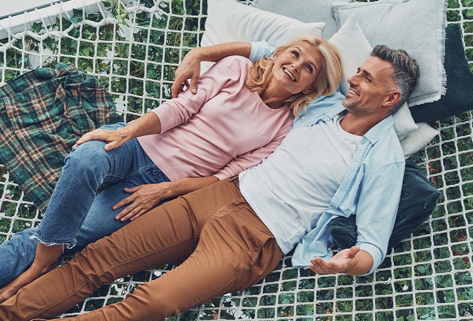 Couple Laying on a Net Together