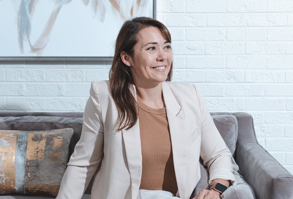 Woman Sitting on a Couch