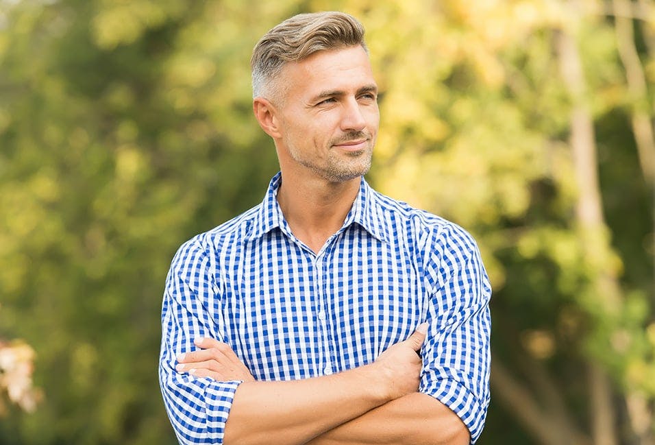 Older Man Posing with His Arms Crossed