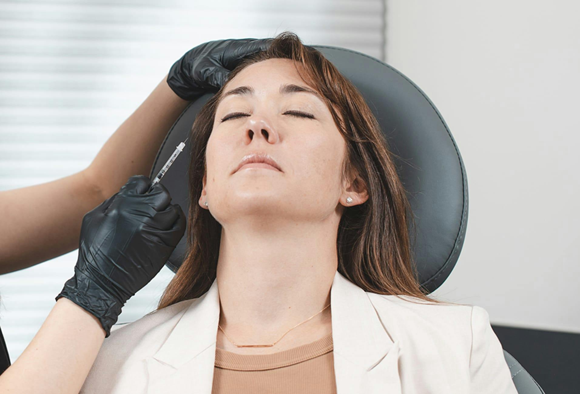 Woman Receiving an Injection