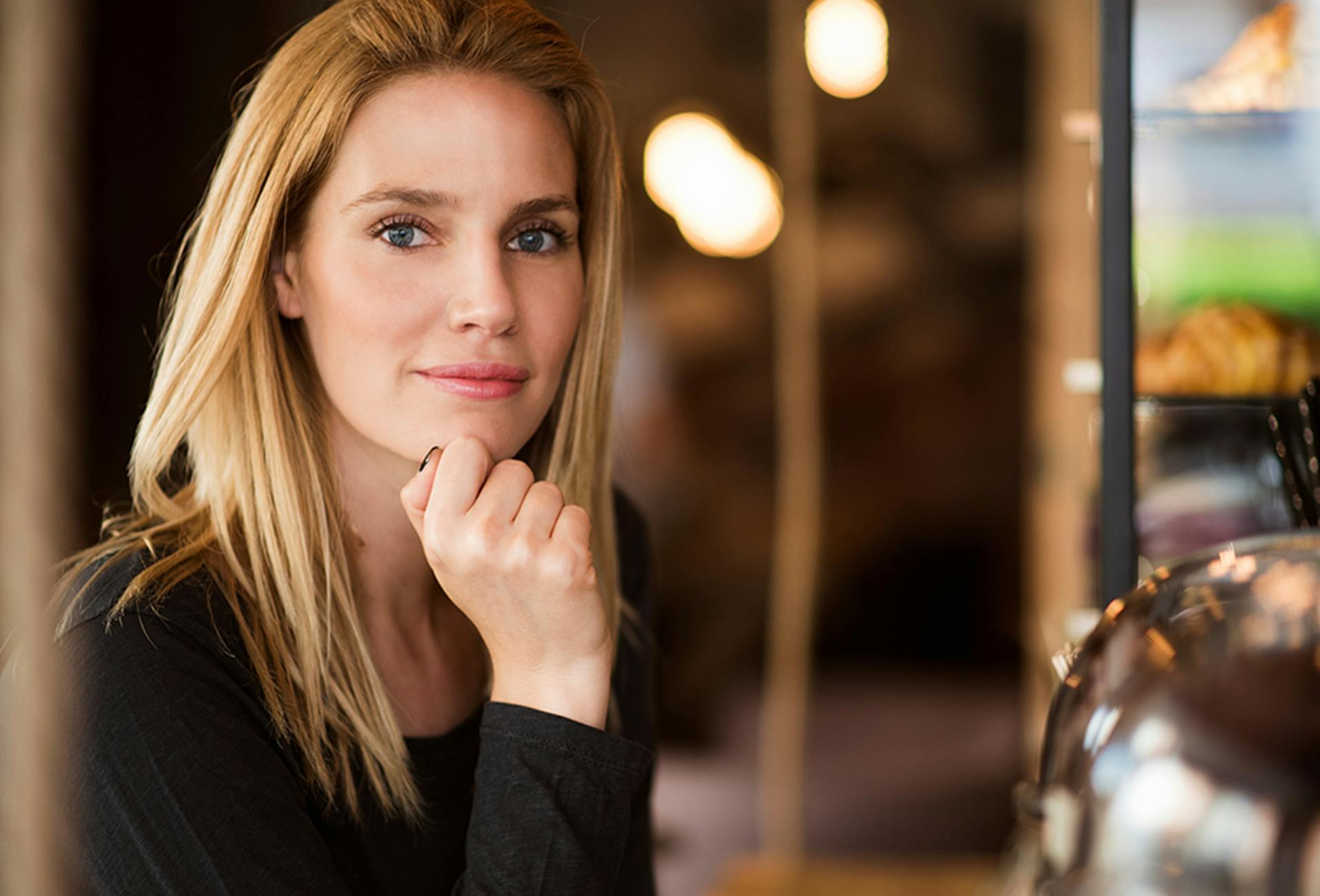 Woman Posing in a Coffee Shop