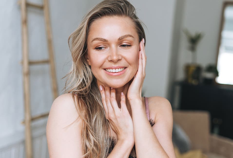 Woman Posing with Her Hands on Her Face