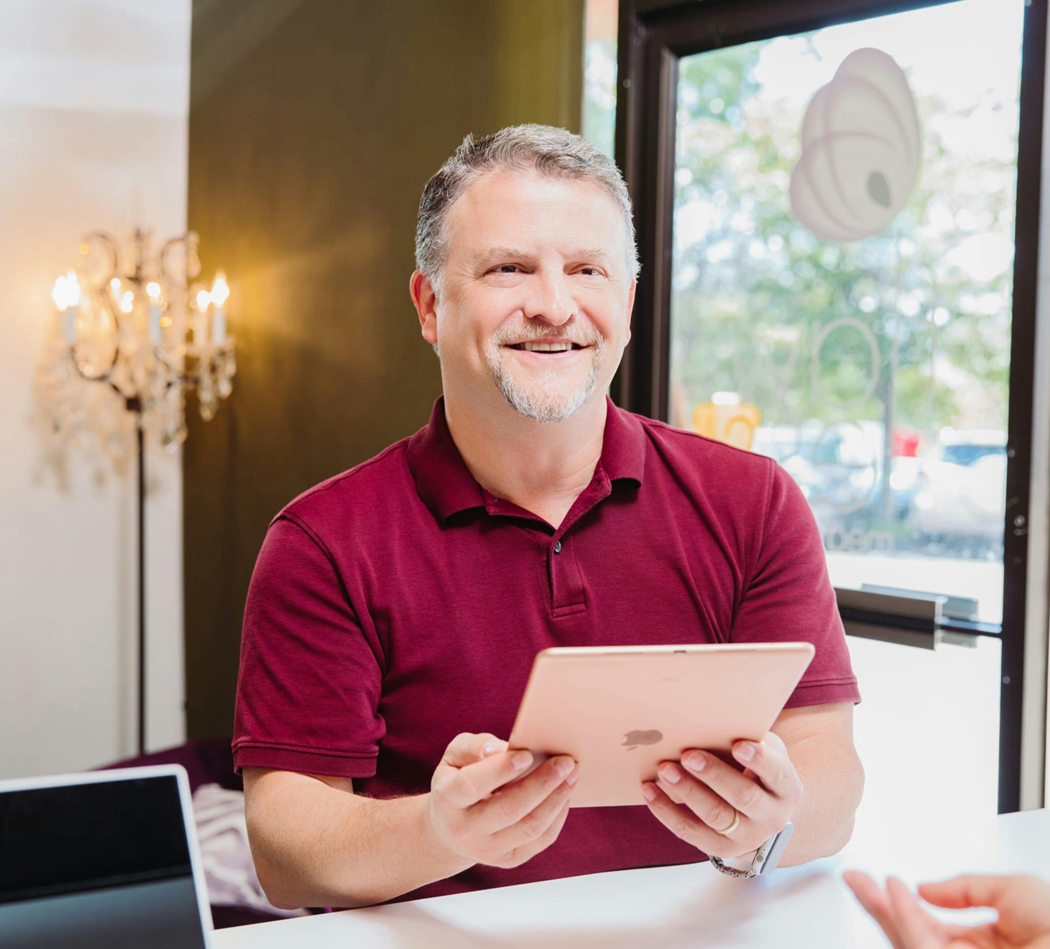 man holding a tablet