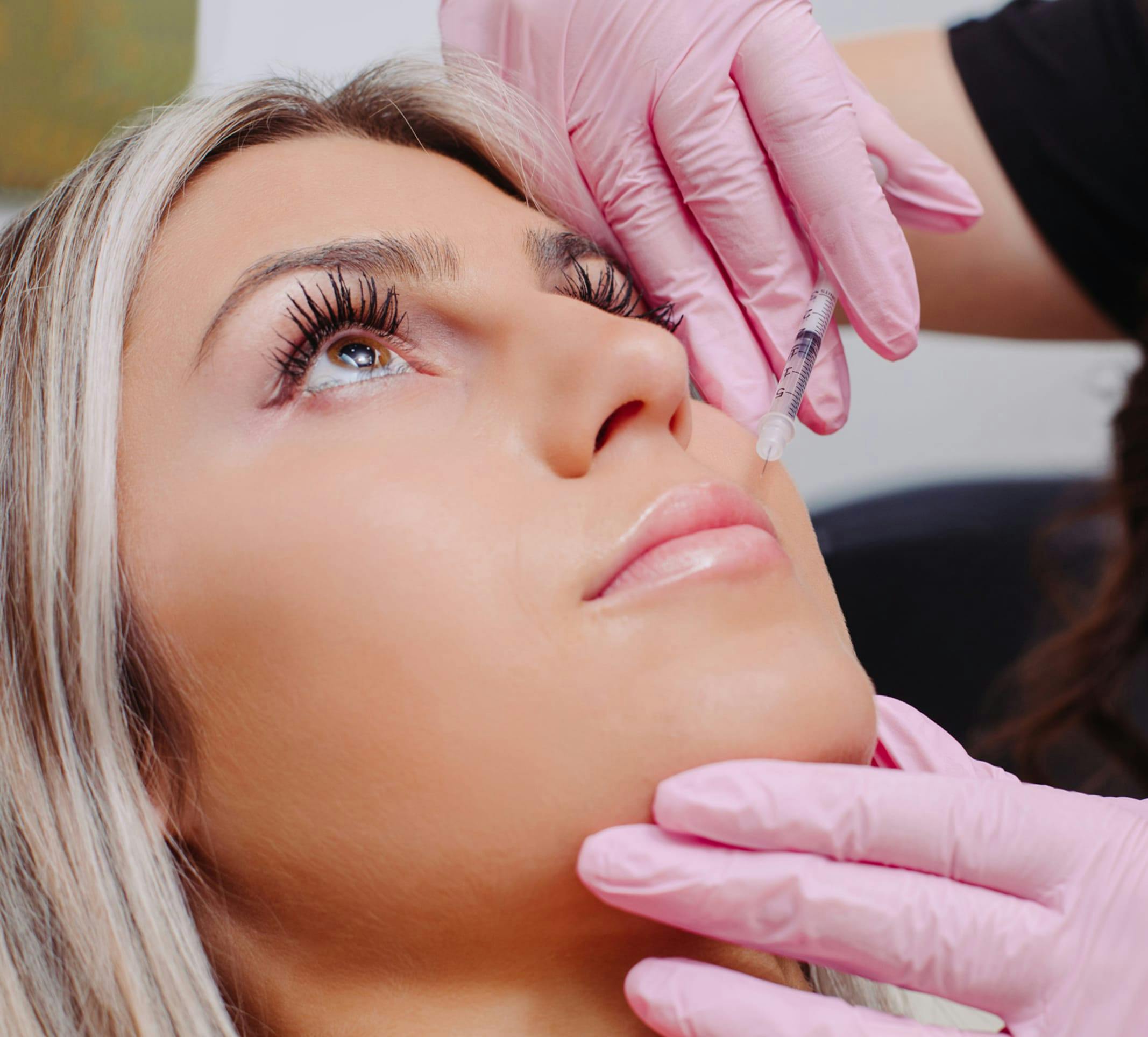 woman getting lip injections