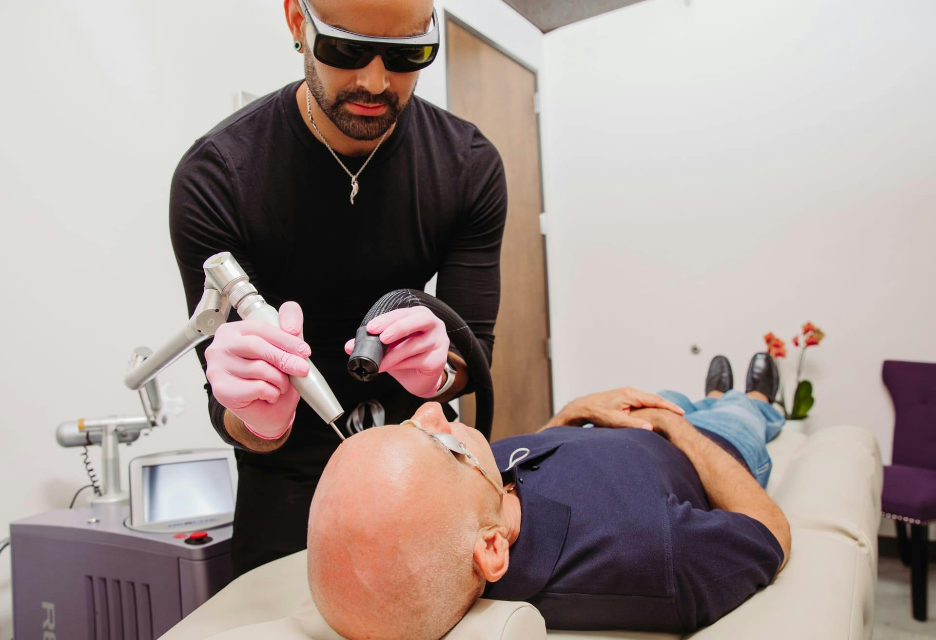 man getting facial treatment