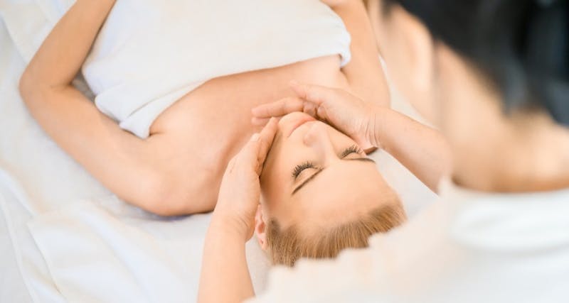 woman getting a face treatment