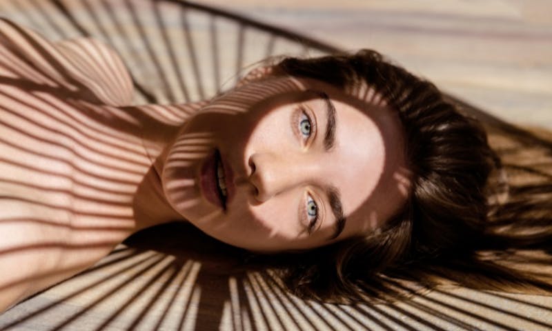 woman with a shadow on her face