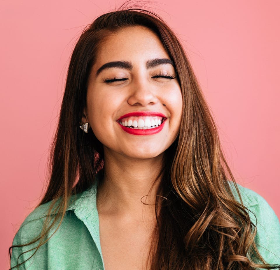 woman smiling with red lipstick