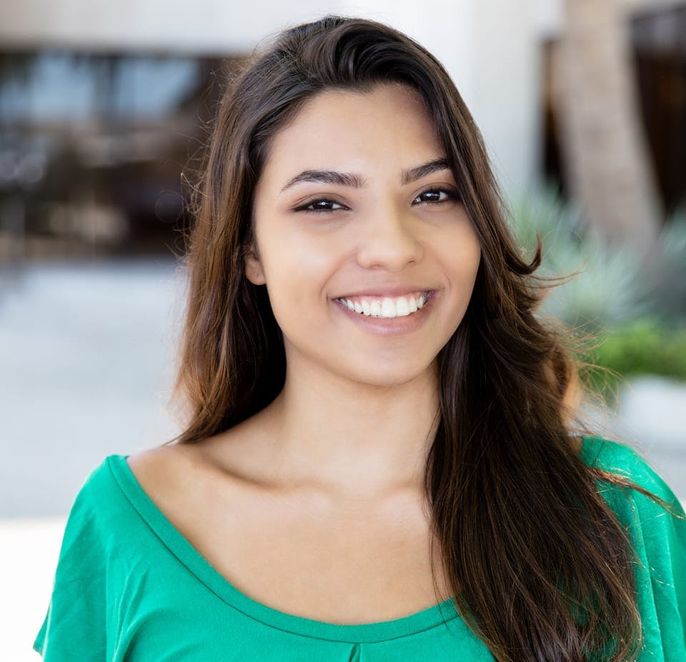 woman in a green top