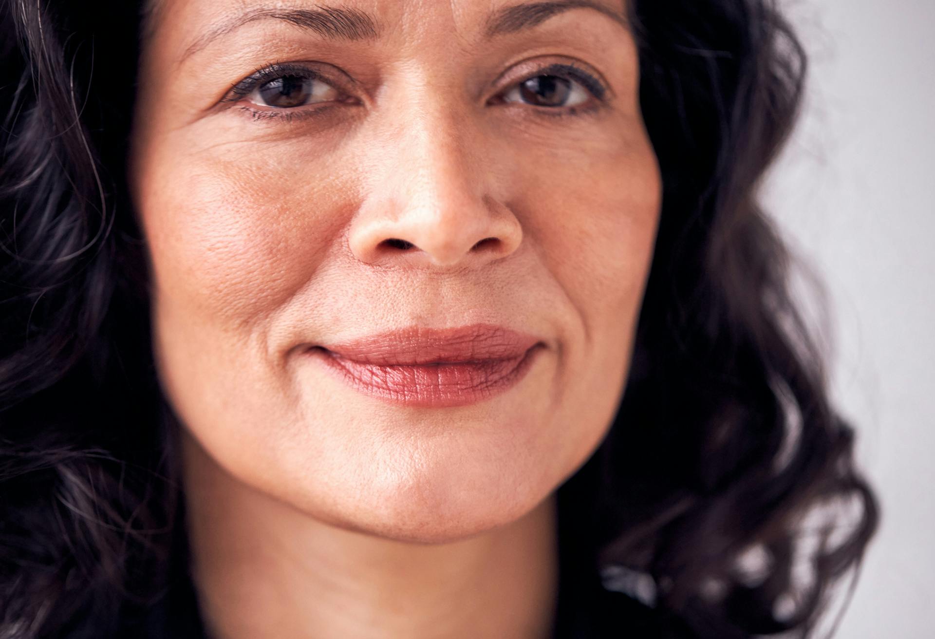 woman with dark curly hair