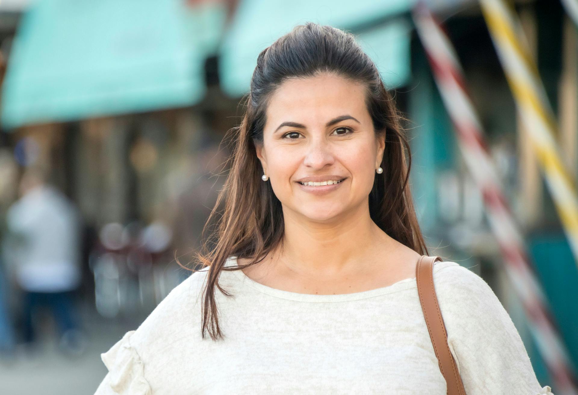 woman with brown hair pulled back