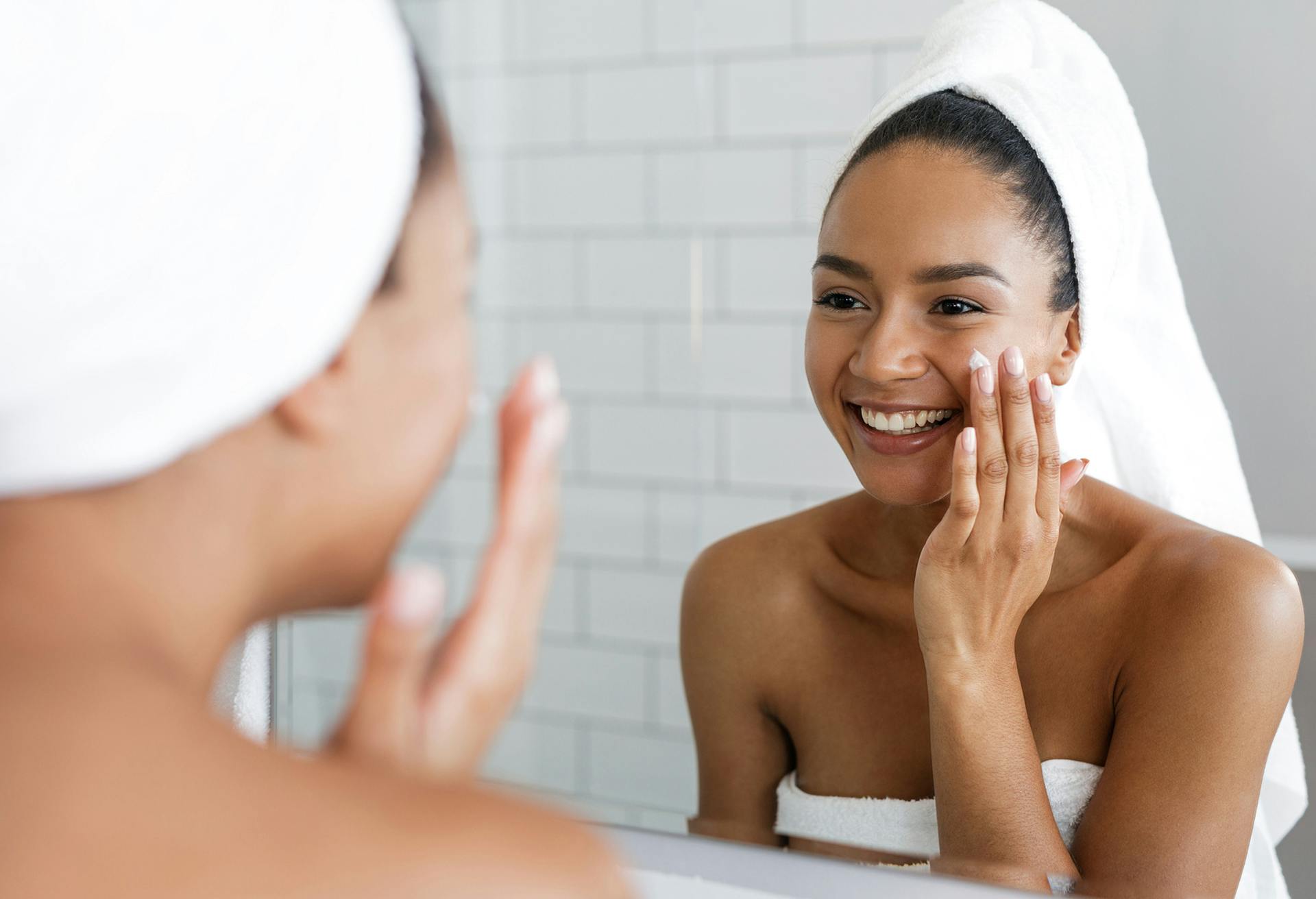 woman washing her face