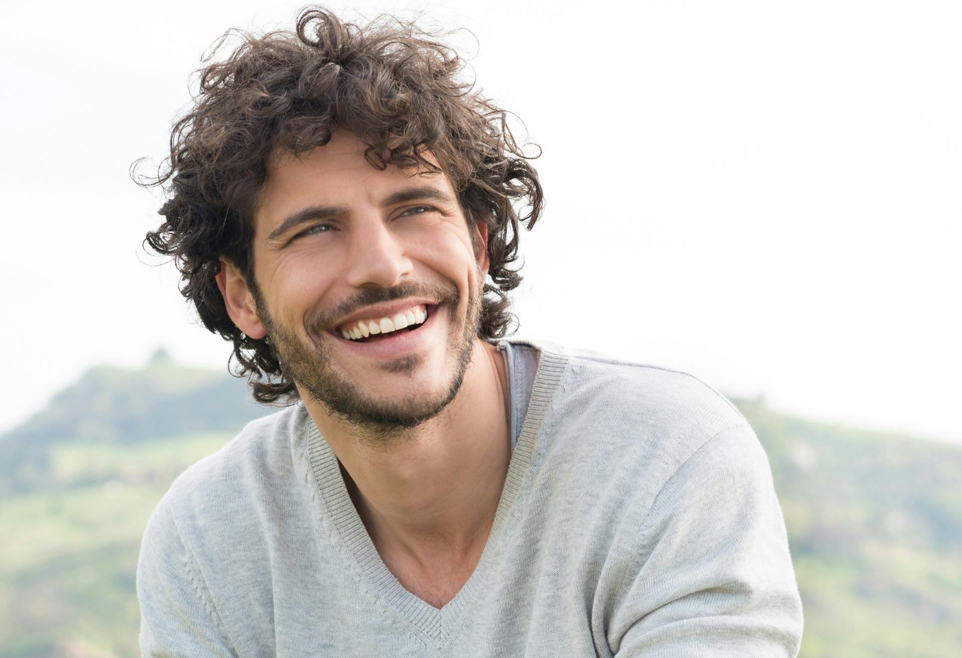 man with curly hair