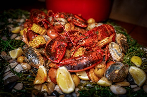 Clambake lobster, clams, lemons