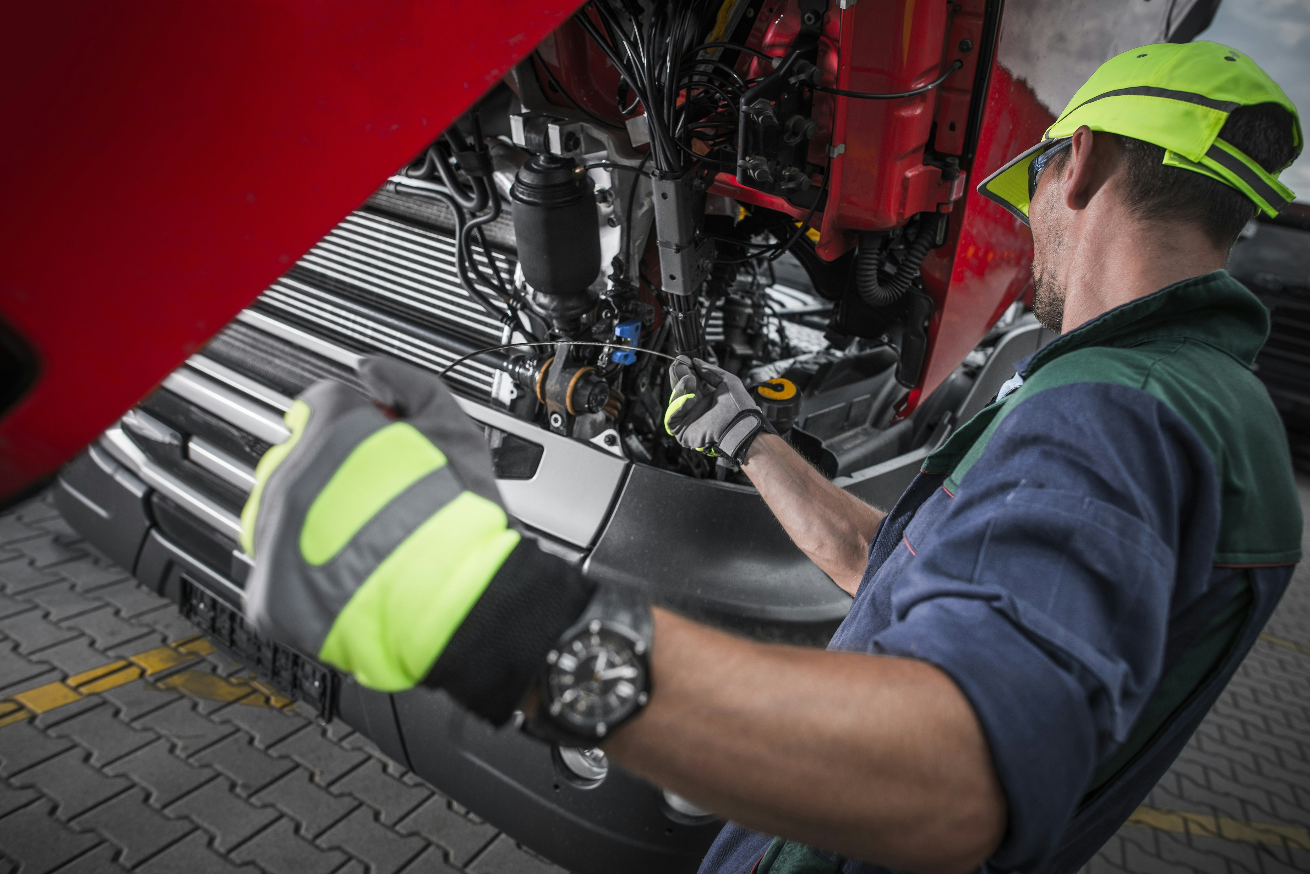 1550593948 Telecom Pp 02 Guy Working On Truck Maintenance