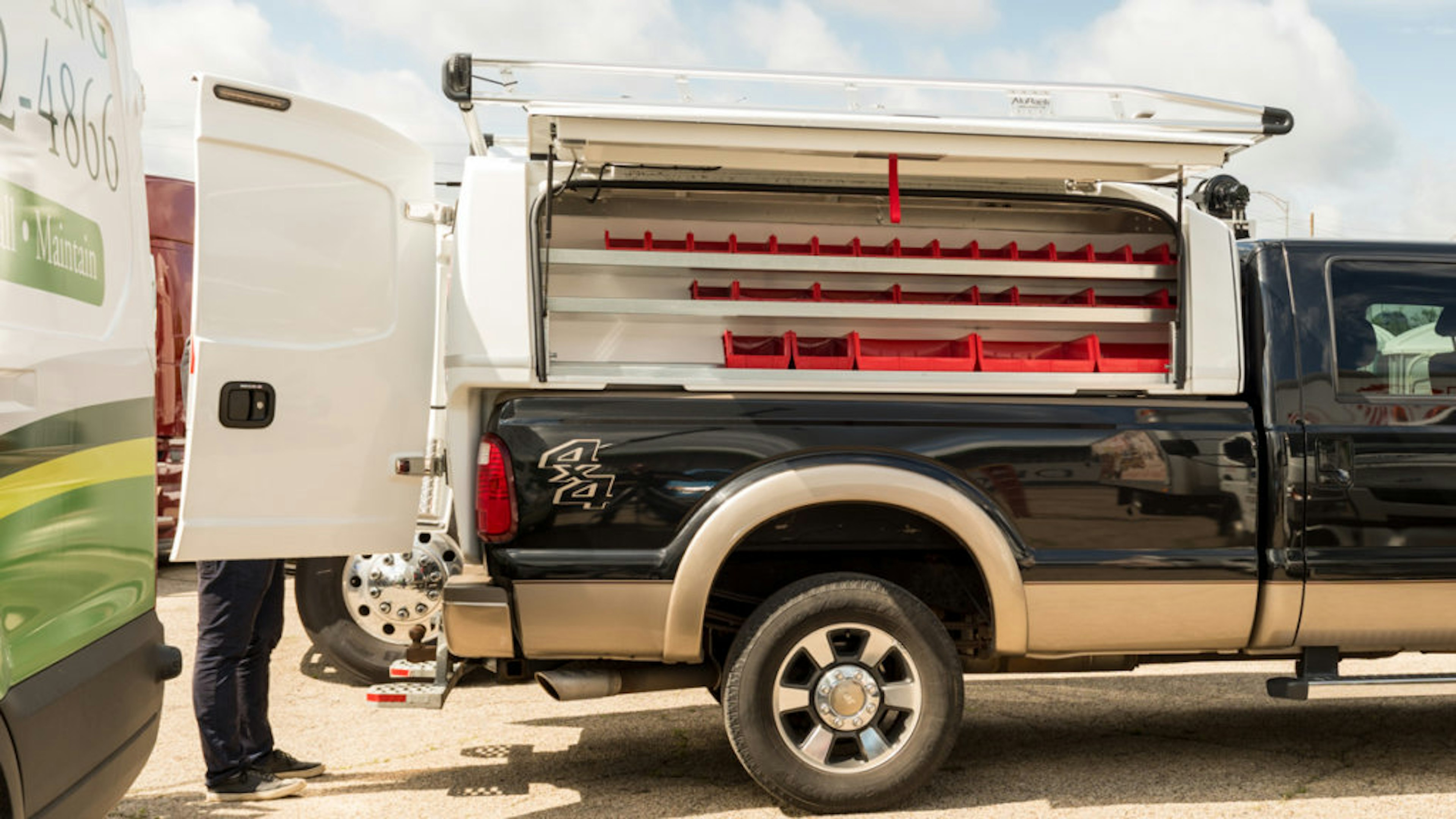 Composite body on the back of a light pickup truck