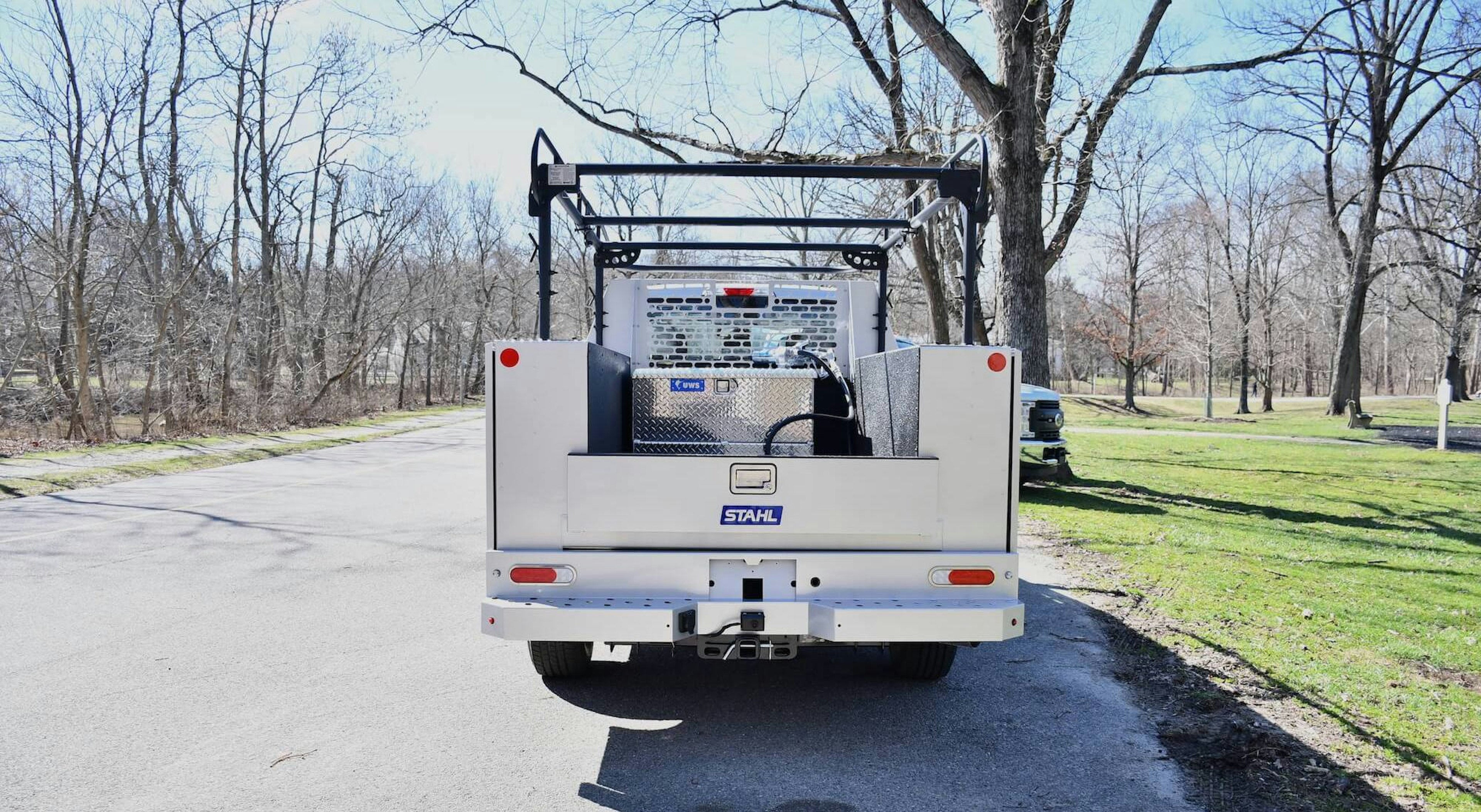 rear of service body with product racks and tool boxes