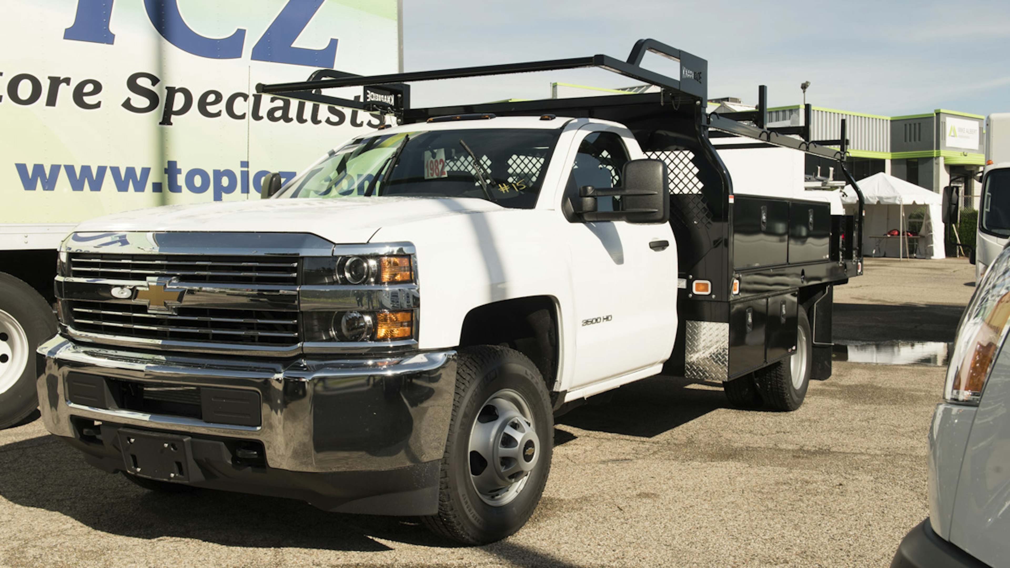 front of service body with product racks and tool boxes