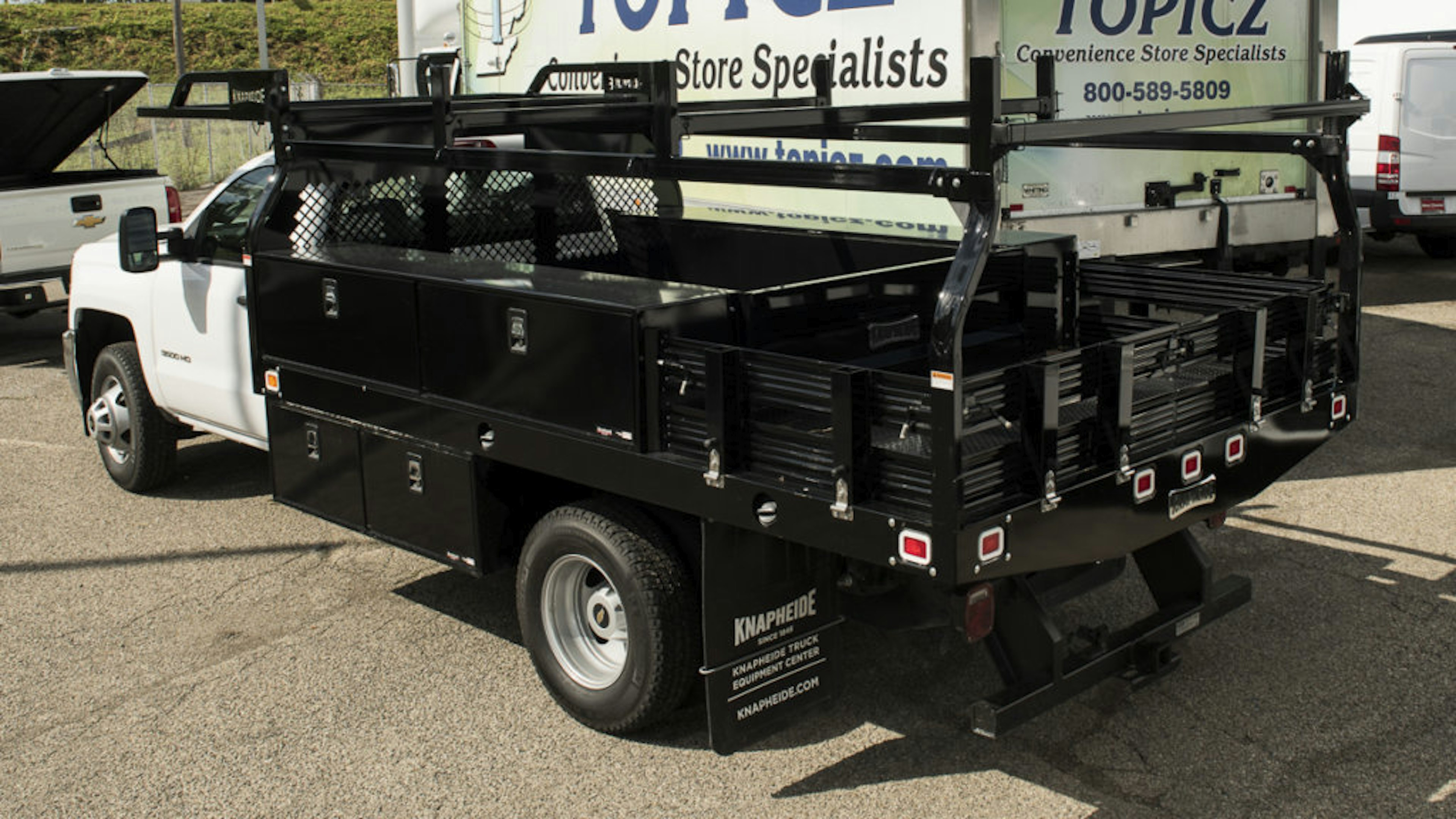 rear of service body with product racks and tool boxes