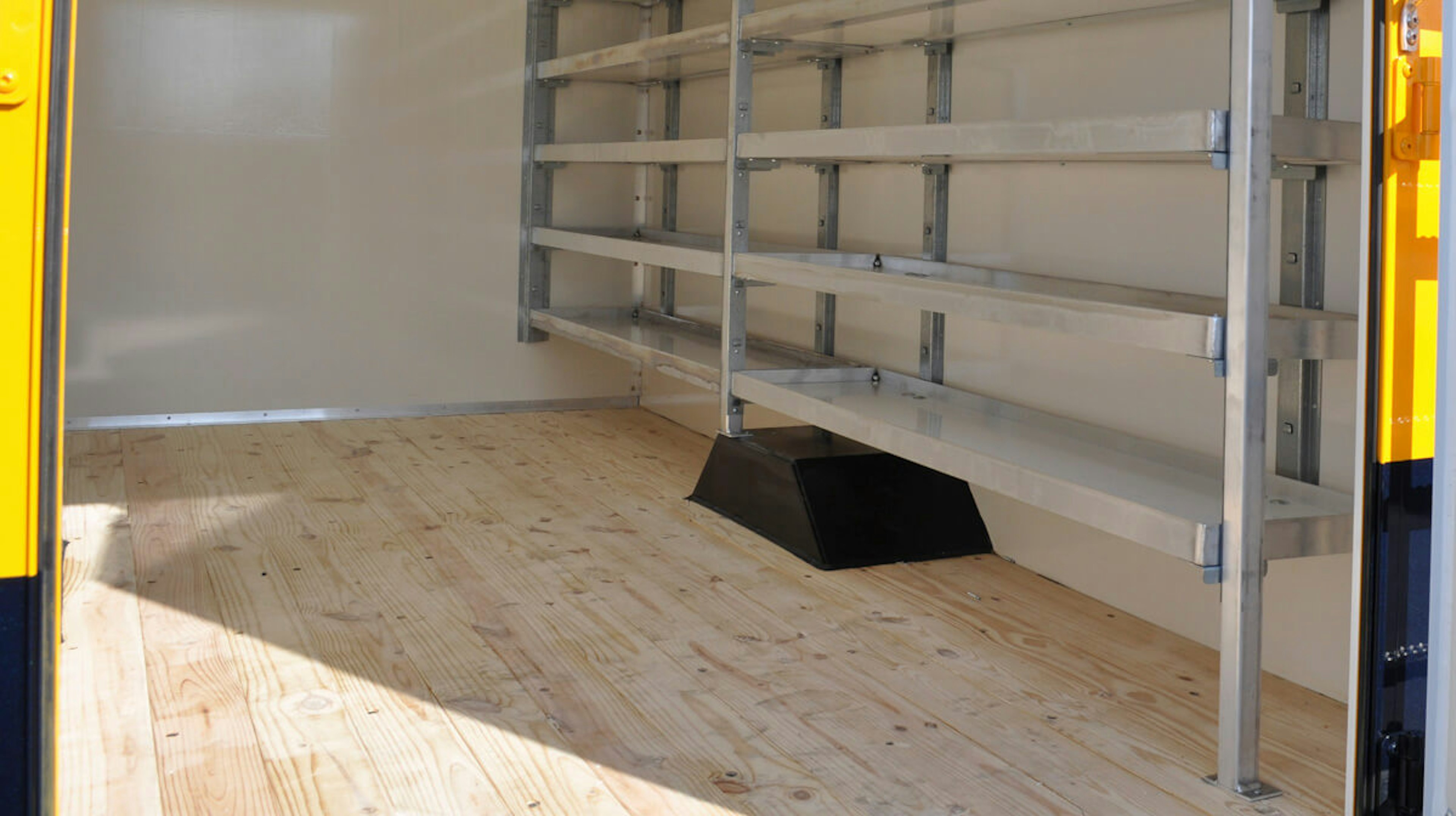 Cut-away with wood flooring and tons of storage space