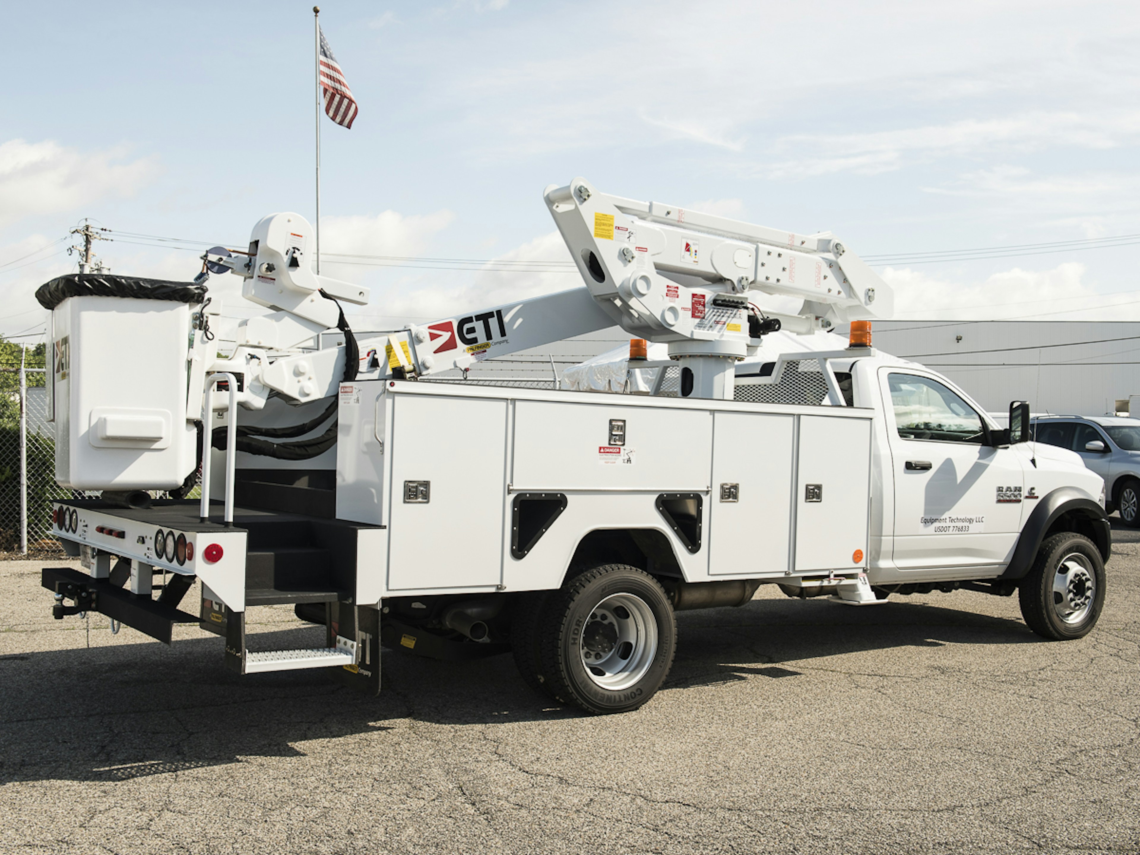 service body with bucket lift and storage cabinets 