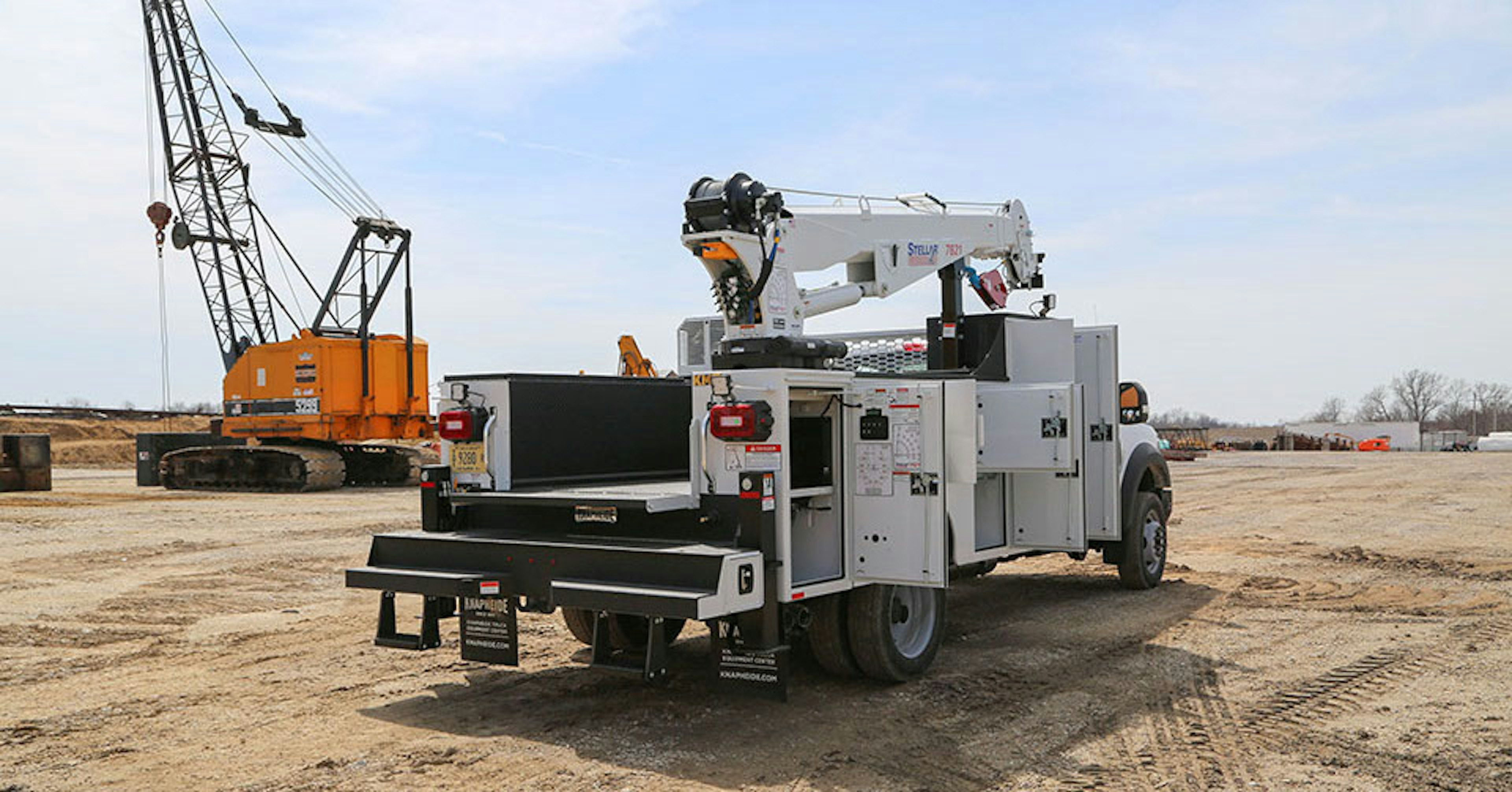 mechanics truck with a variety of options including a crane attachment 