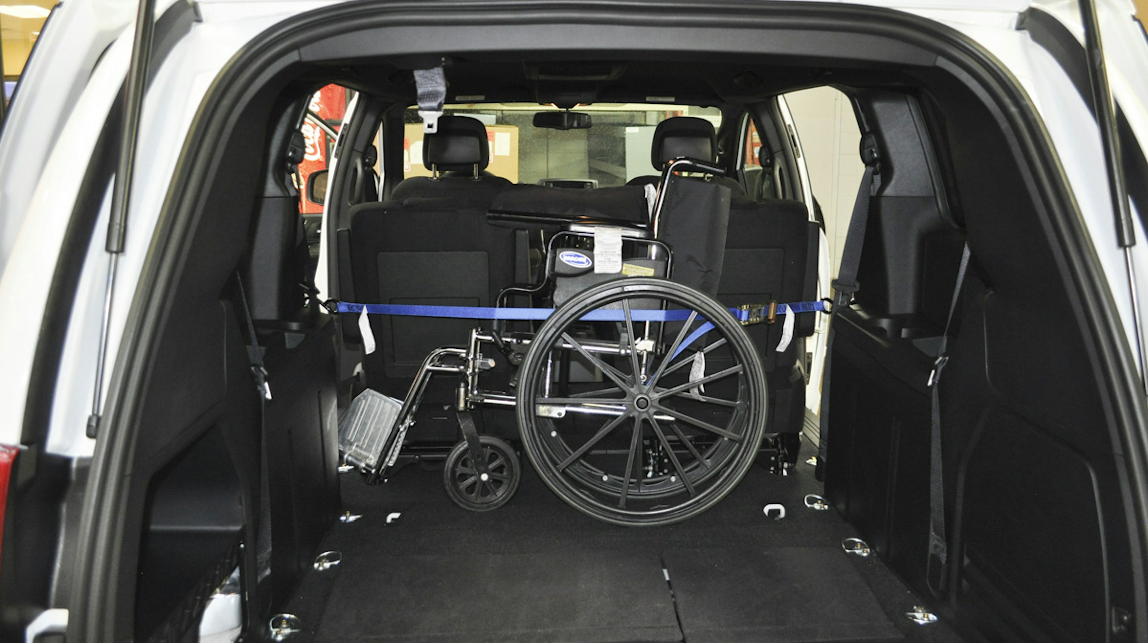 Delivery van with wheelchair storage