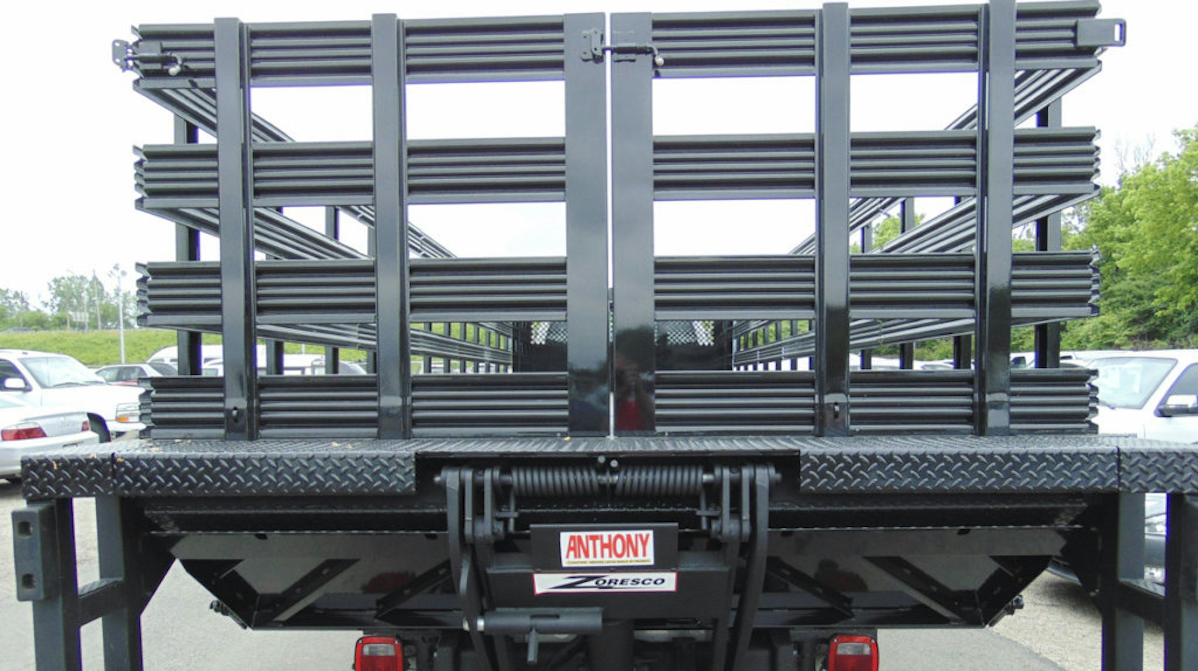 medium service truck with steel stake racks