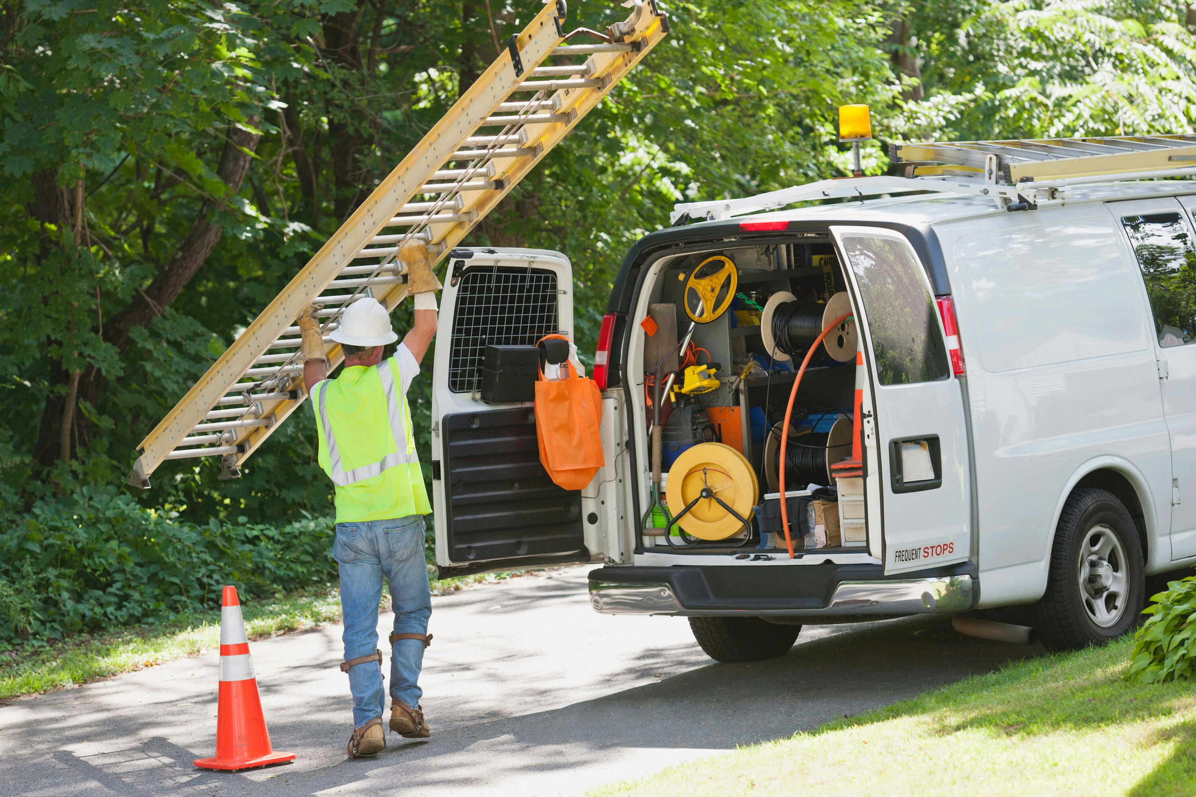 ladder storage on top of a standard van