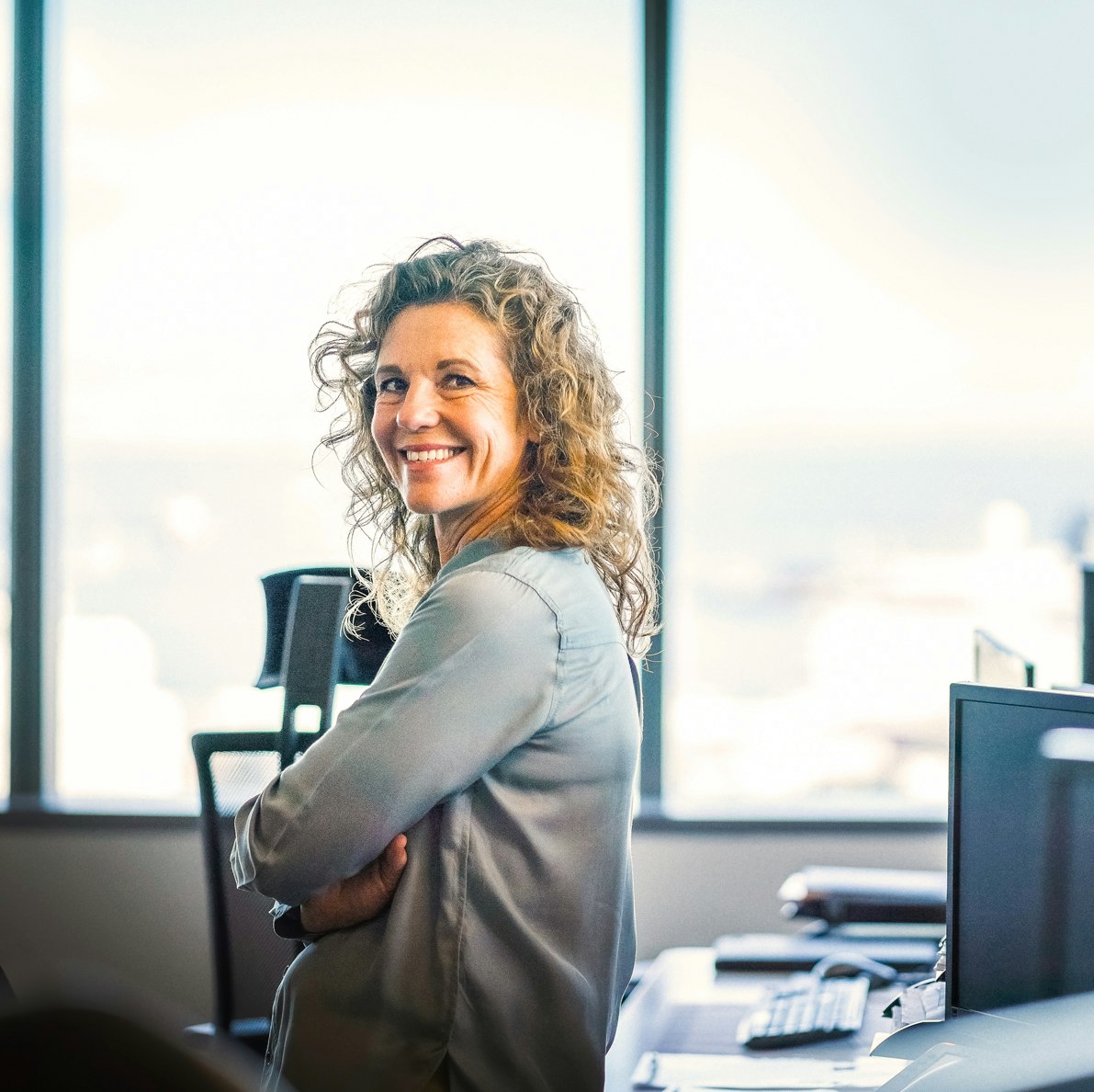 Woman happy with commercial fleet lease and fleet funding strategies by Mike Albert