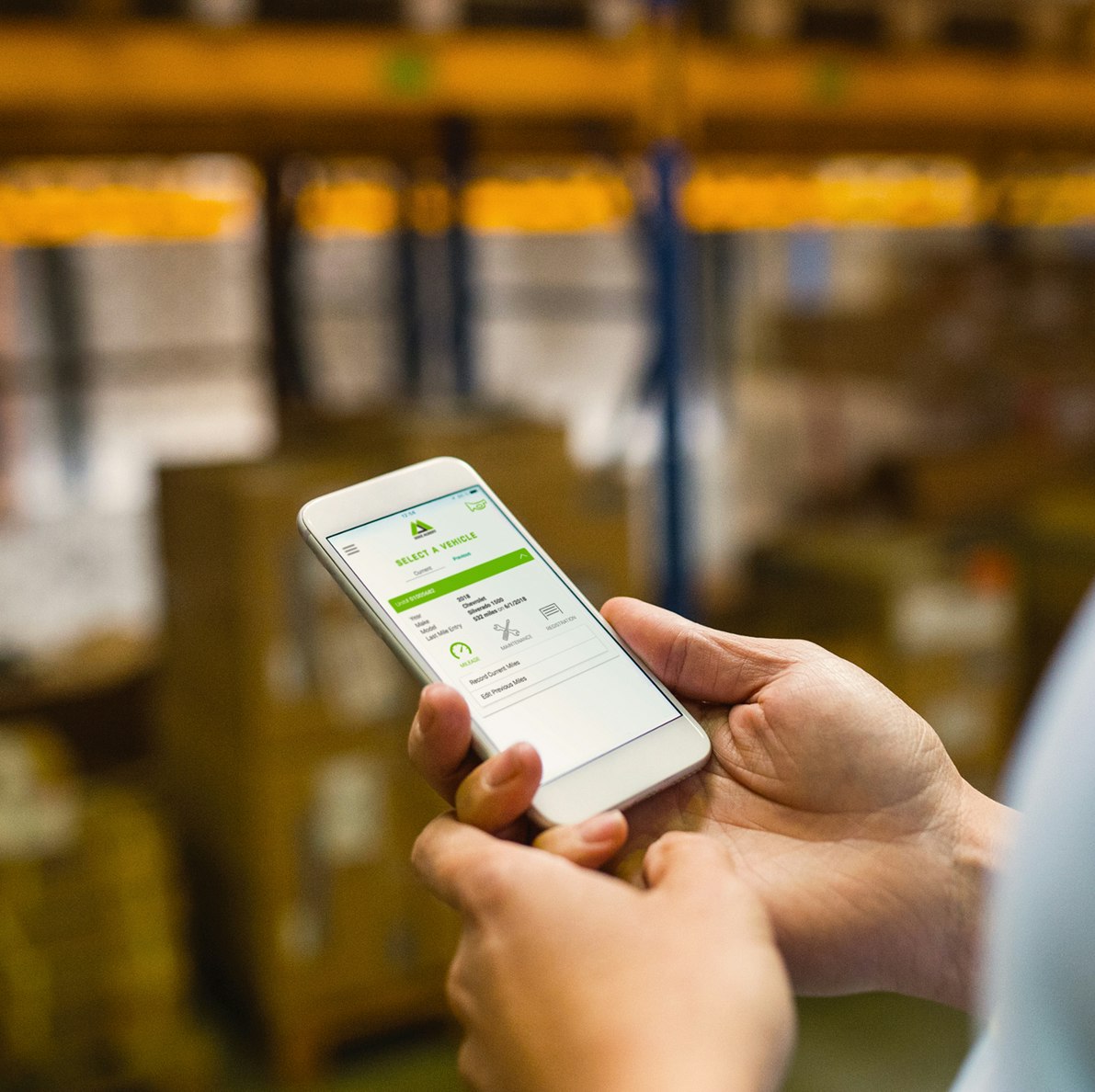 1647380018 Stock Photo Man Warehouse Worker With A Smartphone 244343189