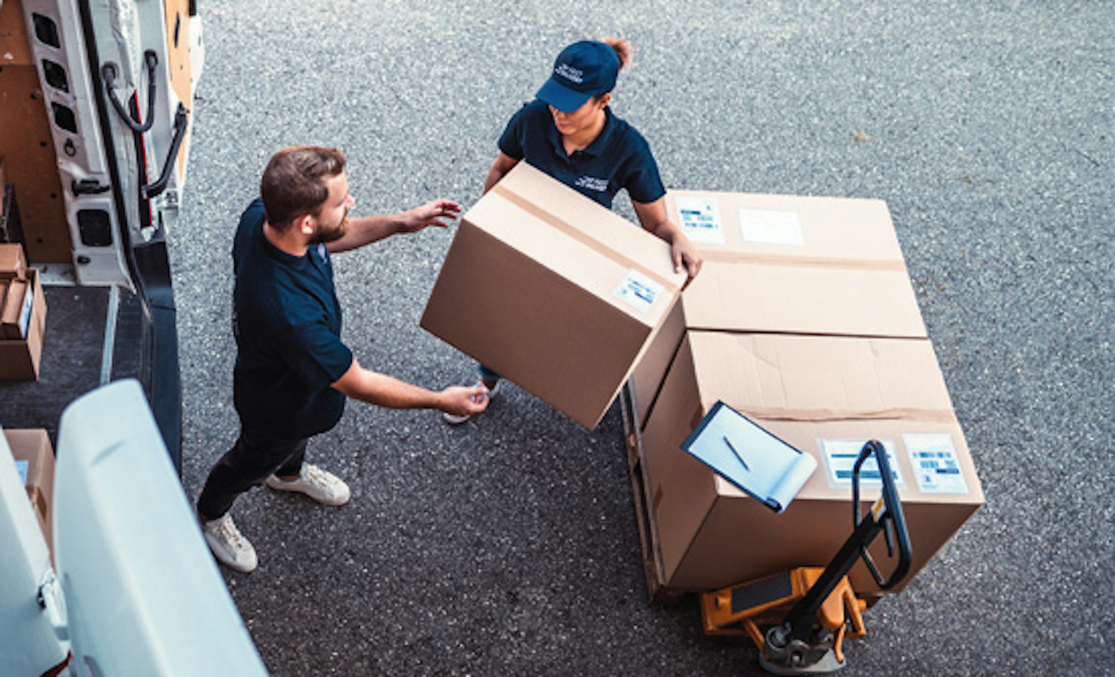 Fleet workers loading their vehicles