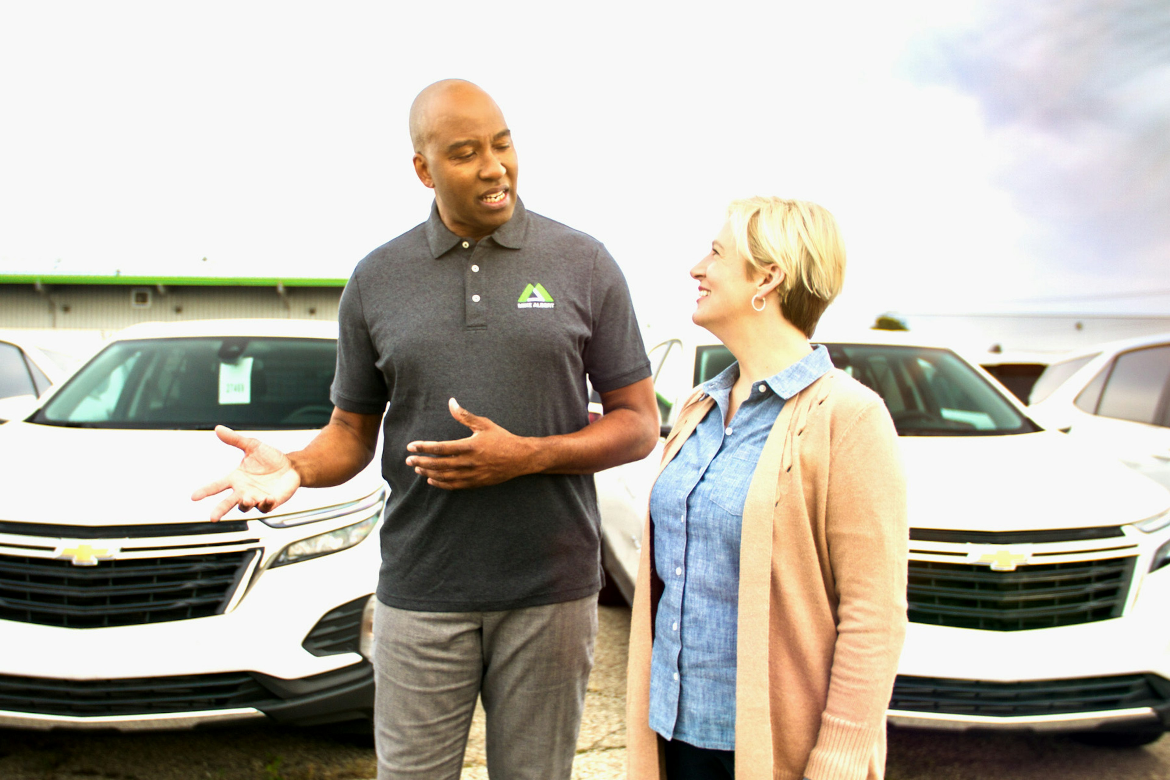 Fleet leasing specialist chatting with client