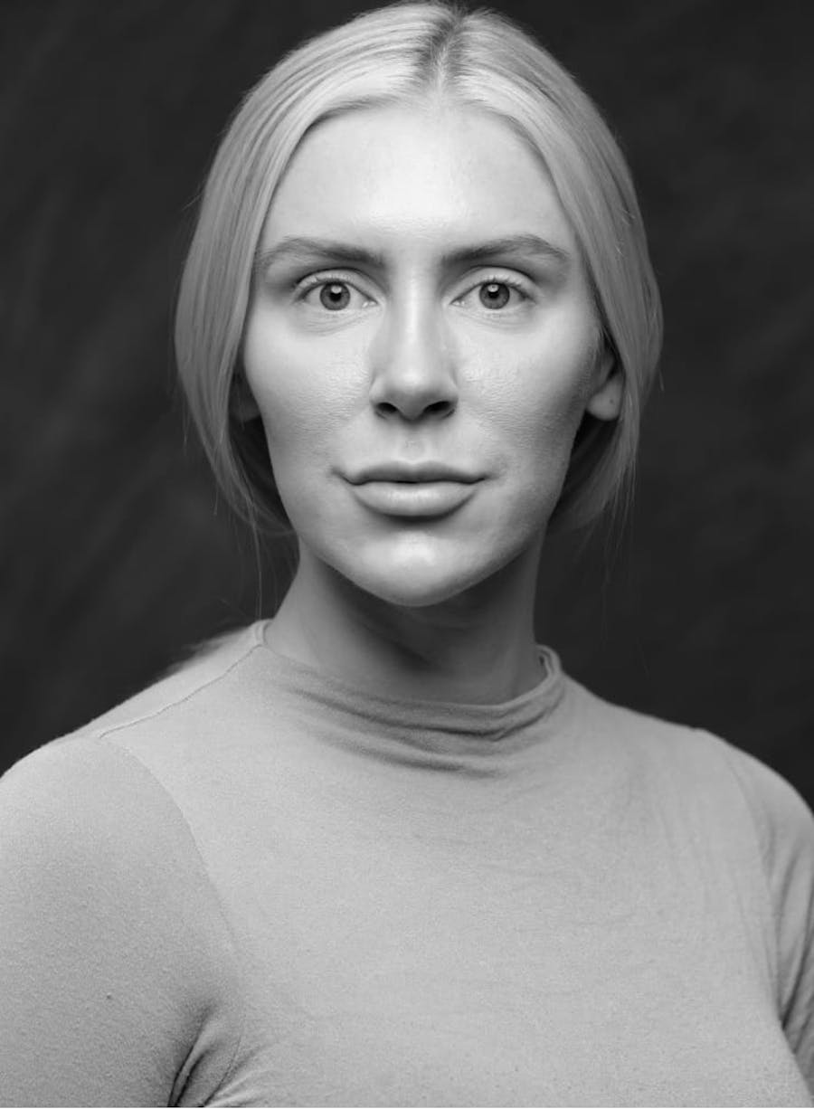 Black and white photo of a woman's face.