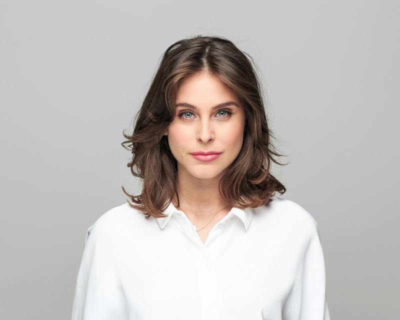 brown haired woman staring