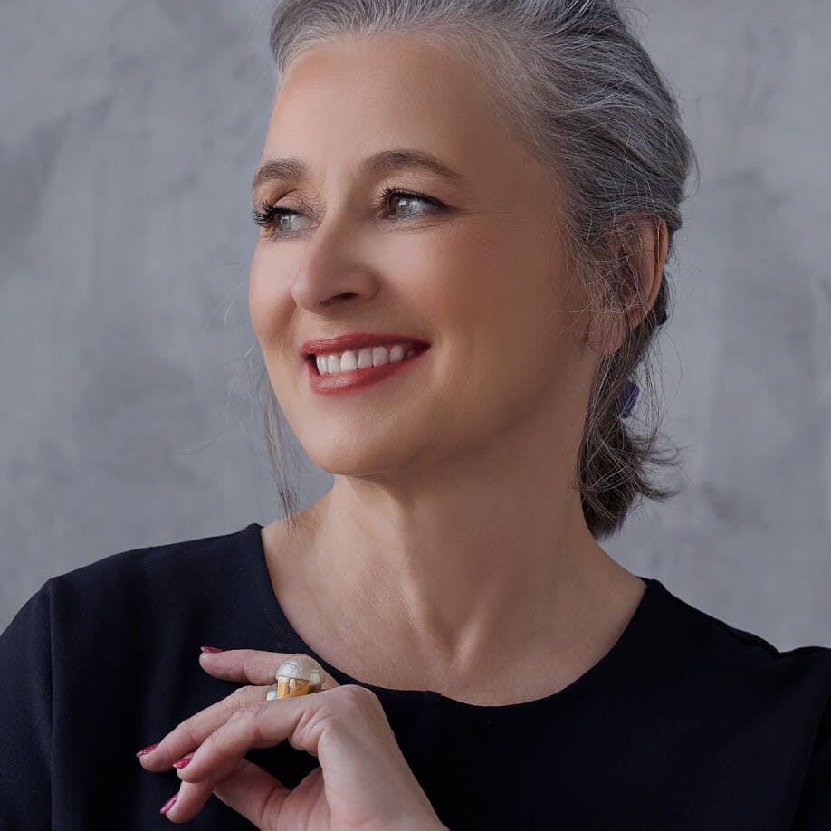 Woman smiling and looking to her right