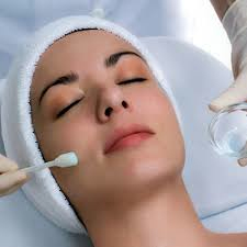 woman receiving chemical peel