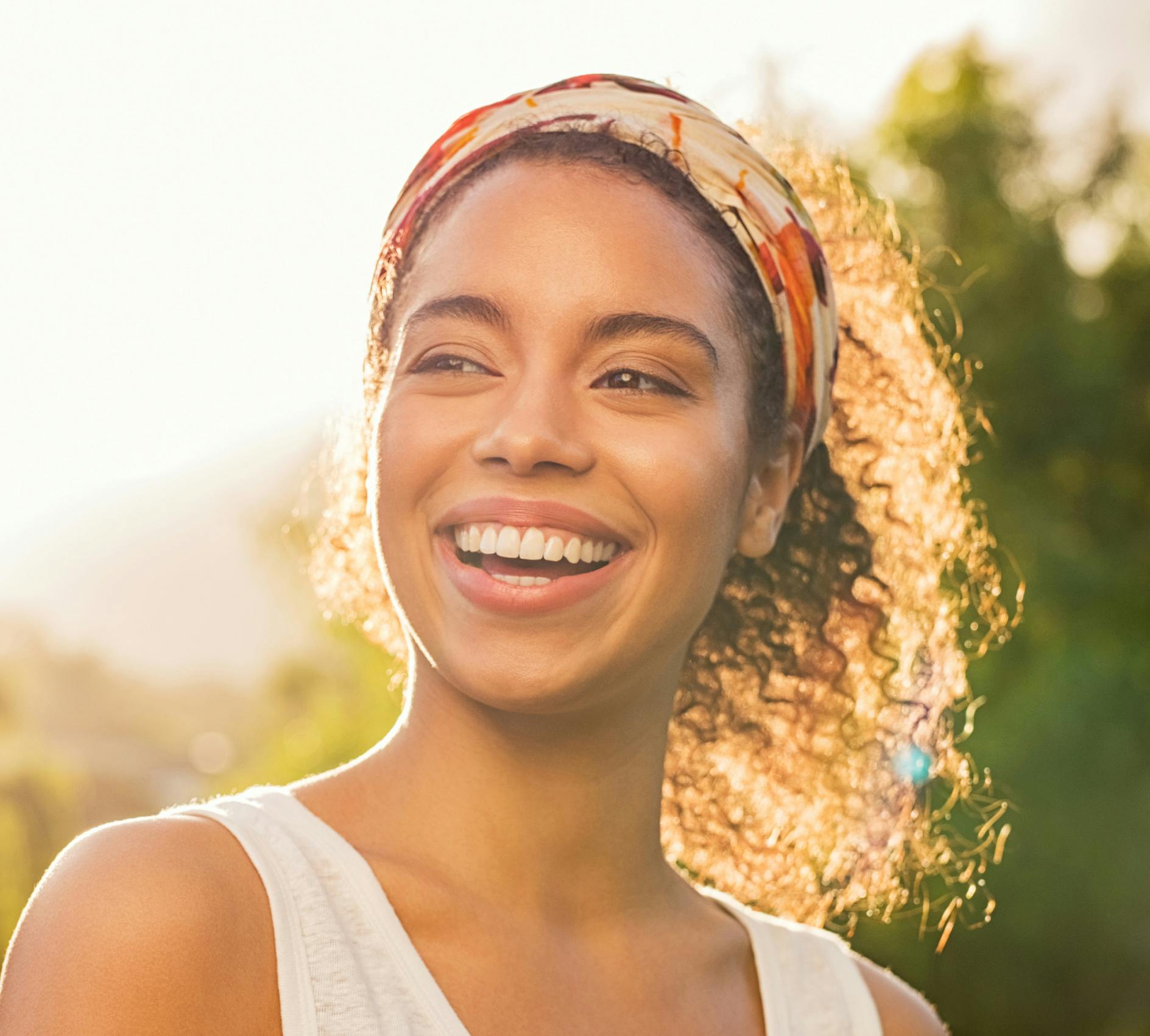 woman laughing in sun light
