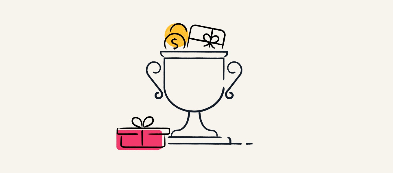 A trophy with gifts in it.