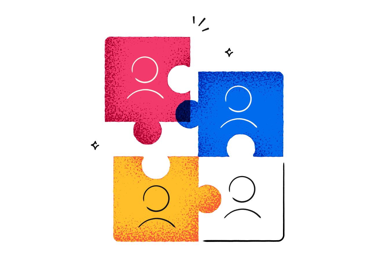 Four puzzle pieces with people - one red, one blue, one yellow, one white