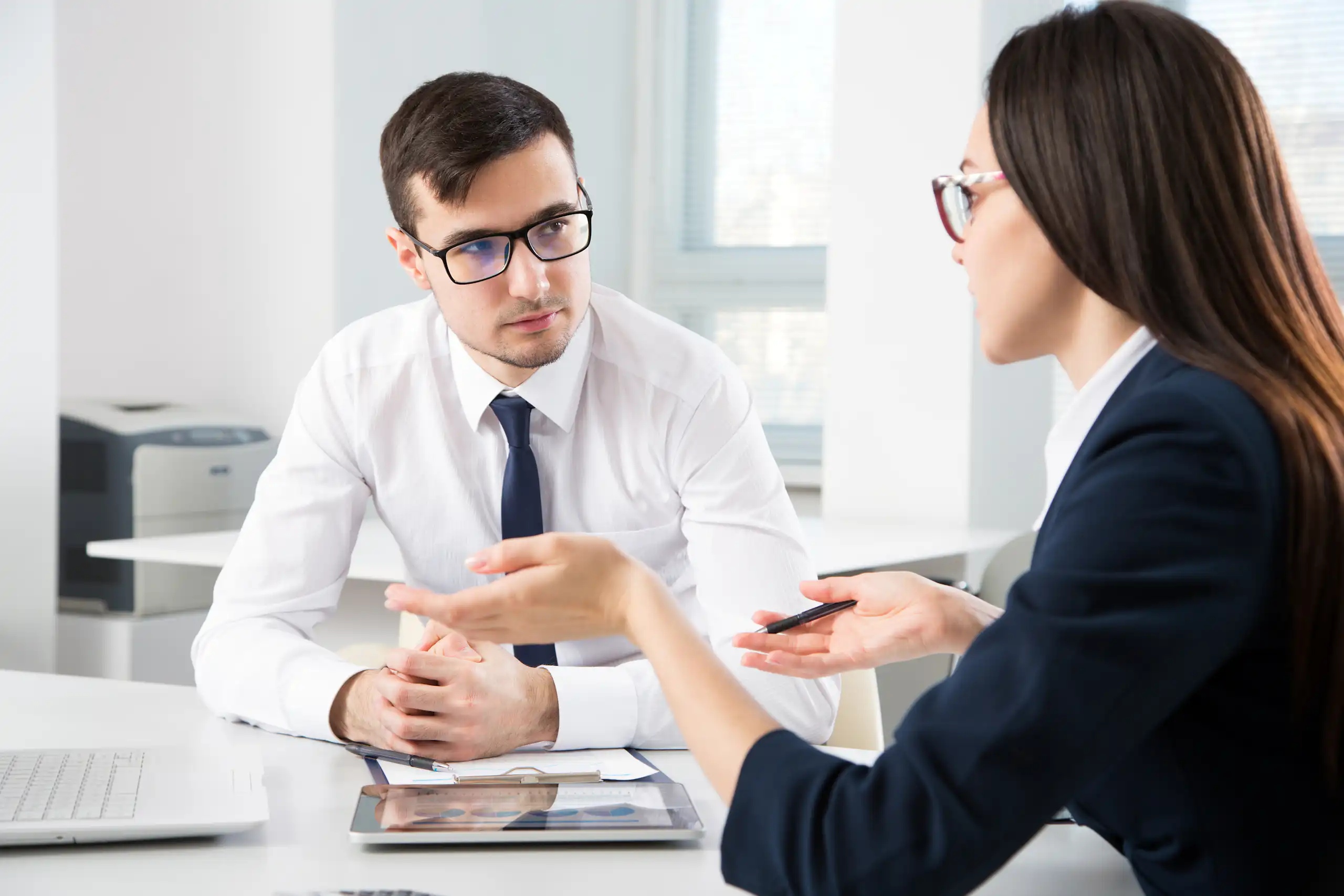Australian manager discussing workplace wellbeing and absenteeism with an employee